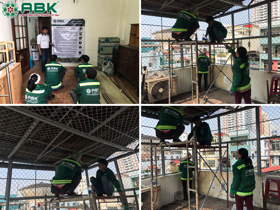 Đội thợ An Bảo Khang thực hiện sơn giàn sắt mái nhà chị Nga